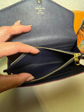 Sarah Monogram Empreinte Leather Wallet
